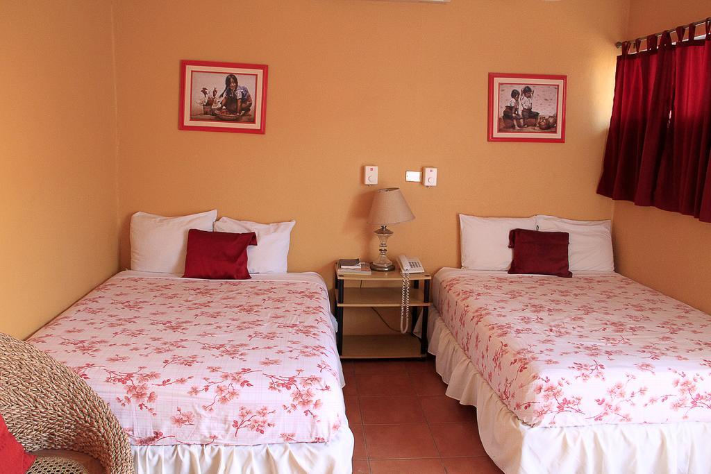 Hotel Y Apartments Los Cisneros Managua Chambre photo